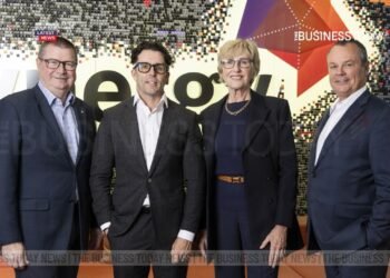 Business professionals collaborating on integrated solutions for operational growth